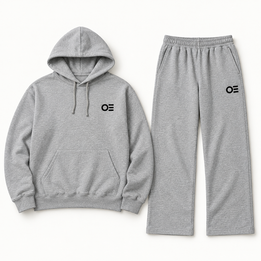 Grey hoodie and open-bottom trousers front view